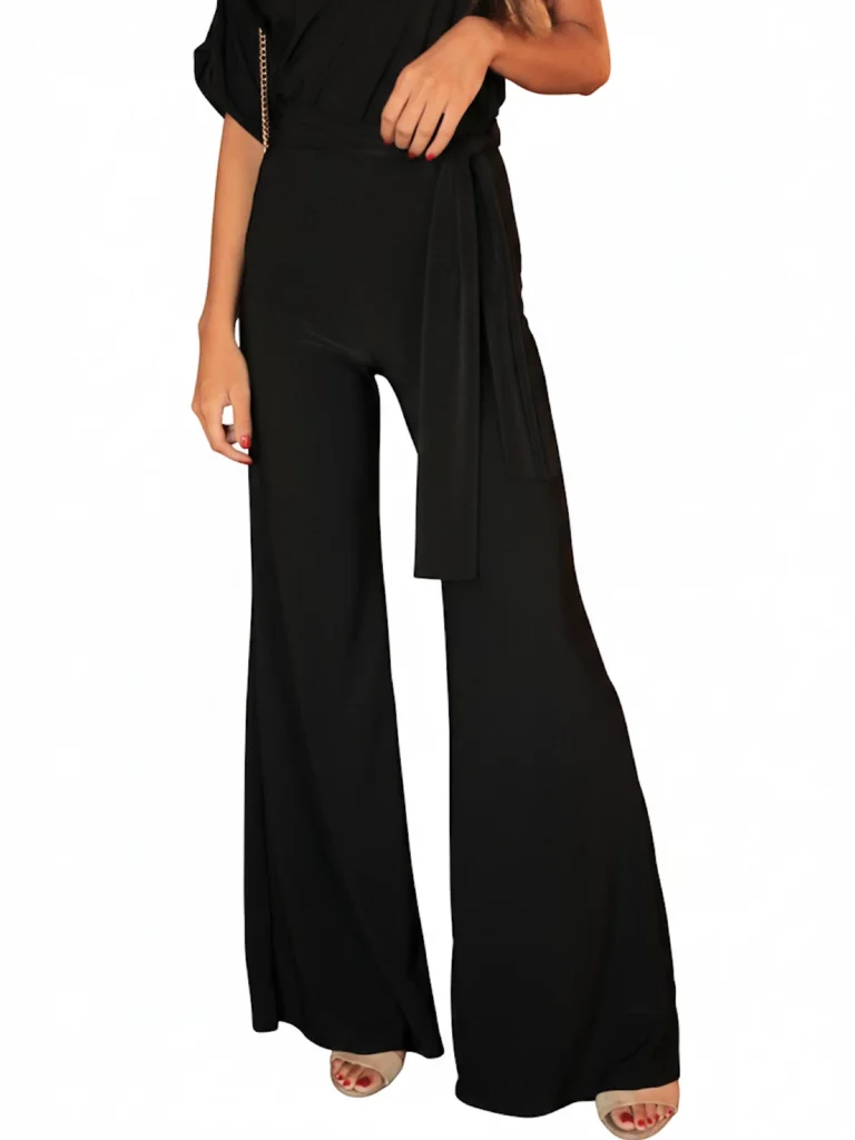 Pantalón negro con cintas cruzadas tipo fajín drapeado y tejido elástico. Diseño elegante y favorecedor ideal para looks sofisticados.